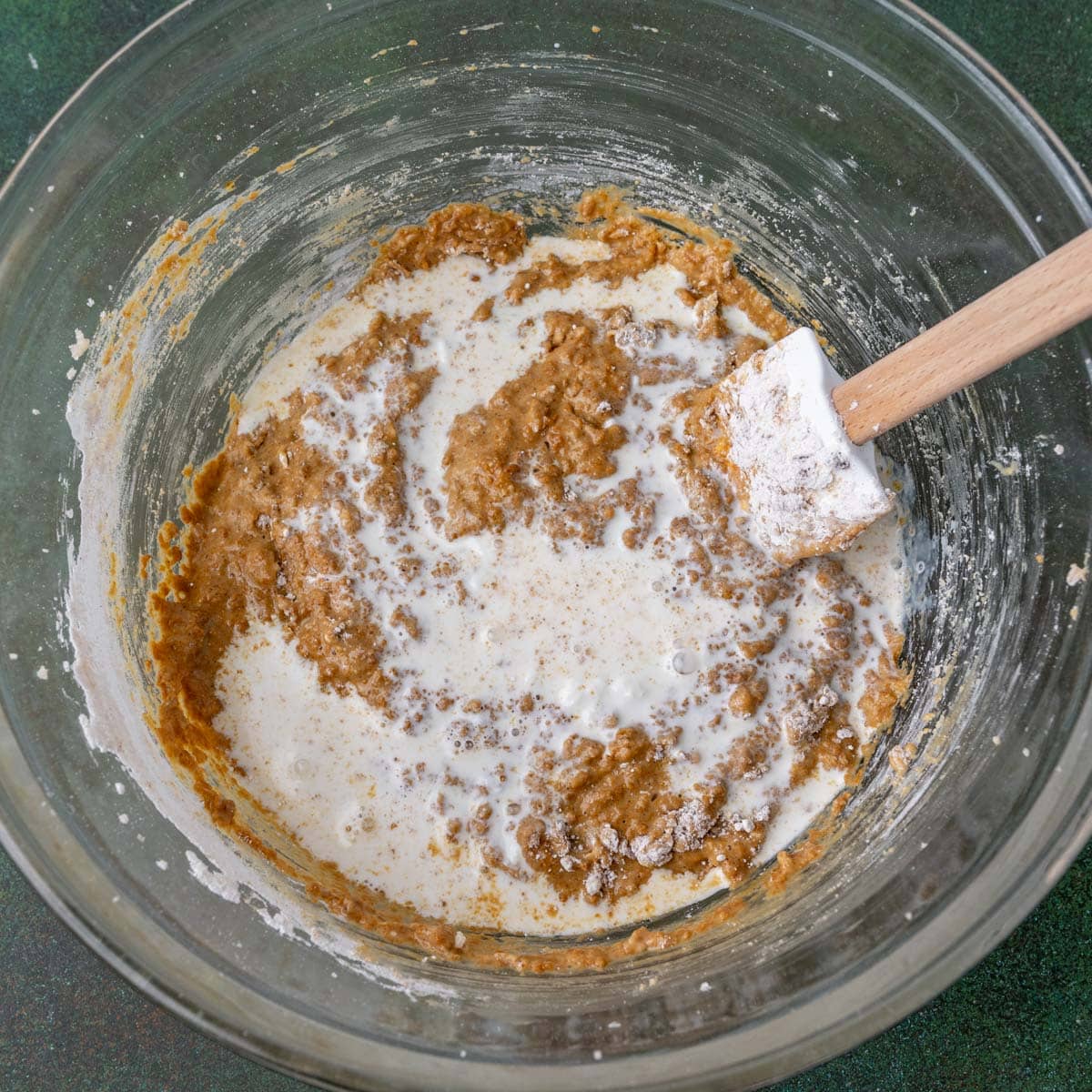 mixing in buttermilk to gingerbread batter