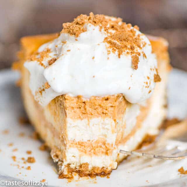 slice of pumpkin swirl cheesecake with a bite out