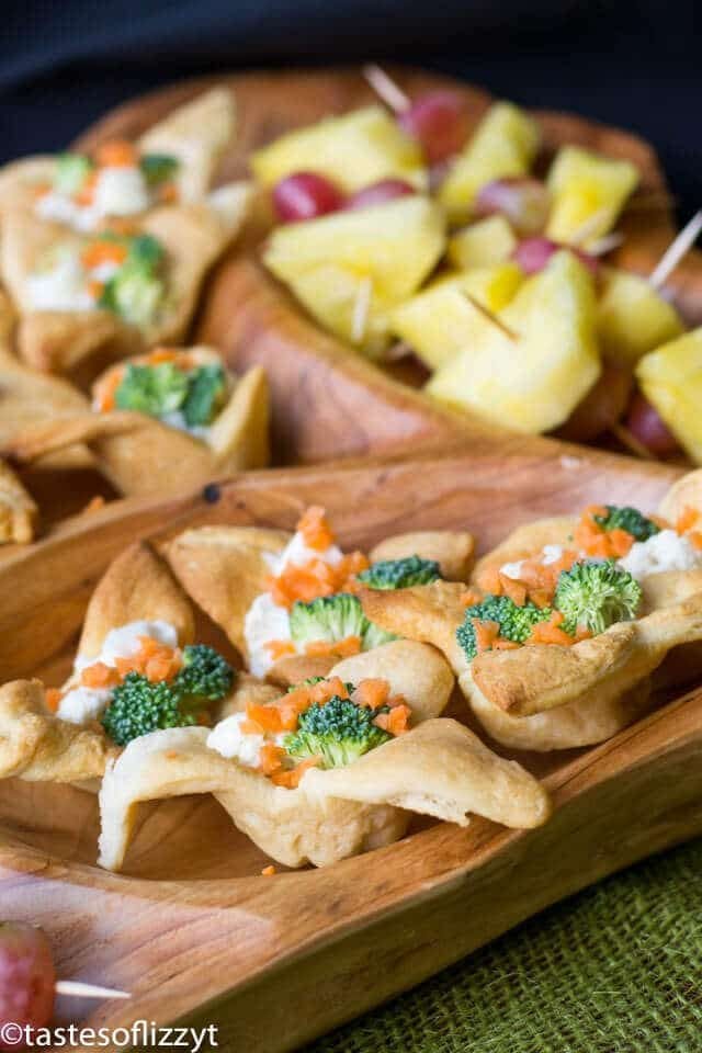 mini veggie pizza appetizers on a platter