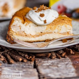 a slice of pumpkin cheesecake on a plate