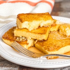 fried cornmeal on a plate with syrup