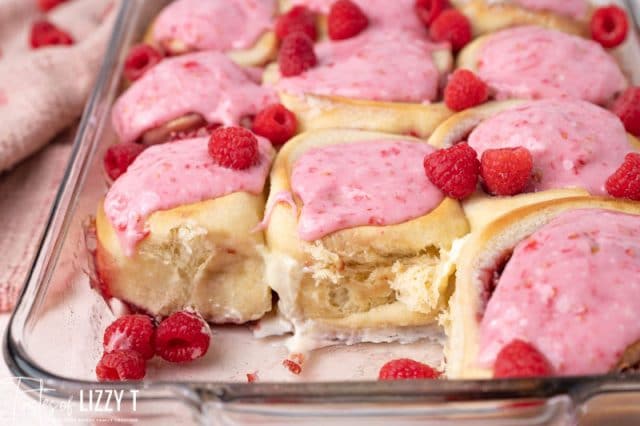 raspberry sweet rolls in a baking pan