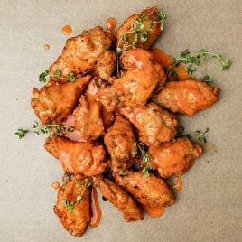 buffalo chicken wings on parchment paper