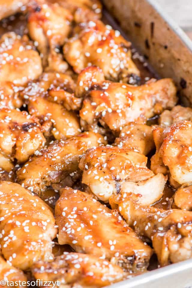 A close up of chicken wings in baking pan