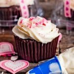 A close up of a cupcake on a cutting board