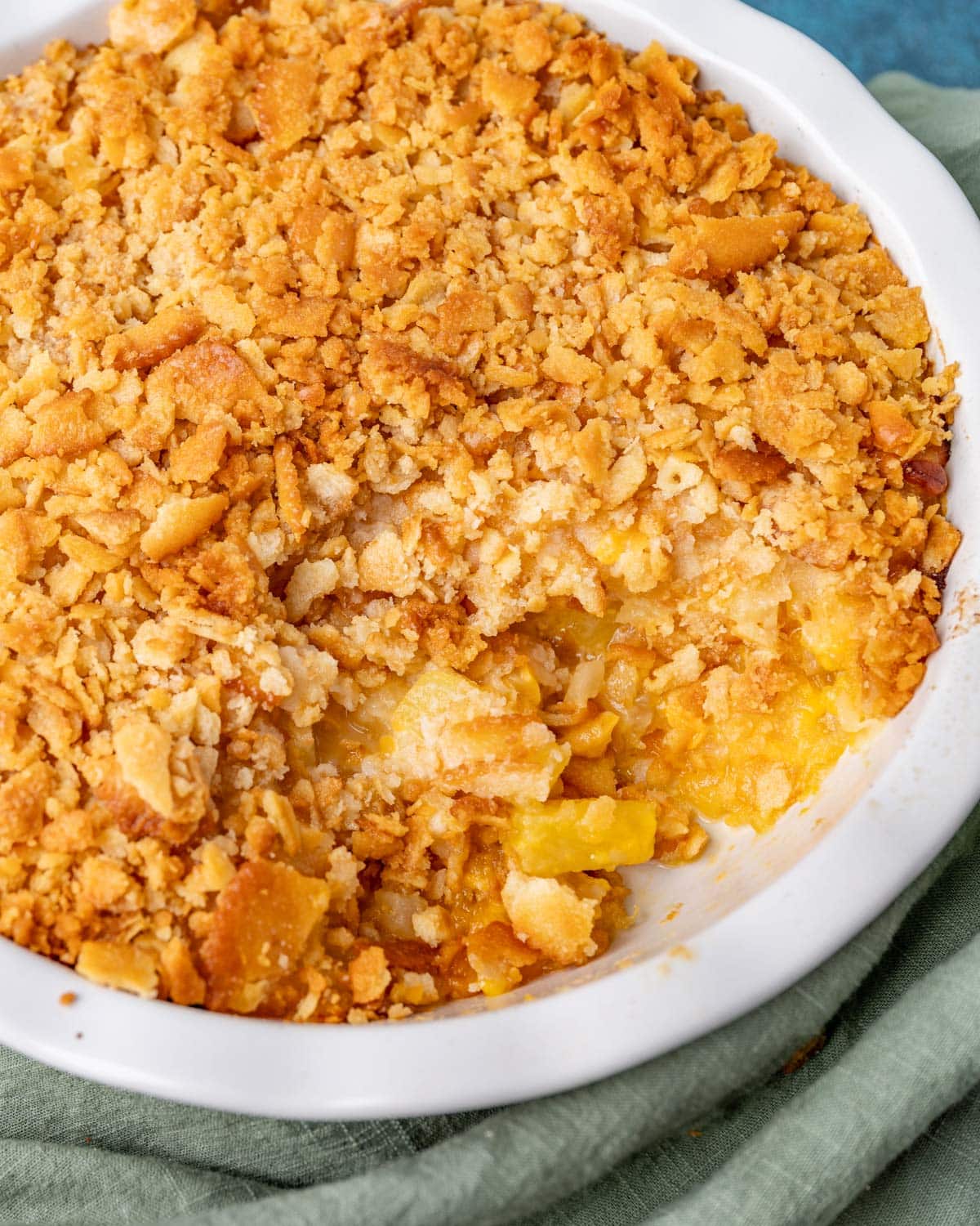 southern pineapple casserole in a round baking dish