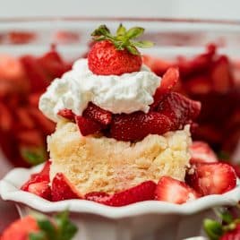 strawberry shortcake with whipped cream in a bowl