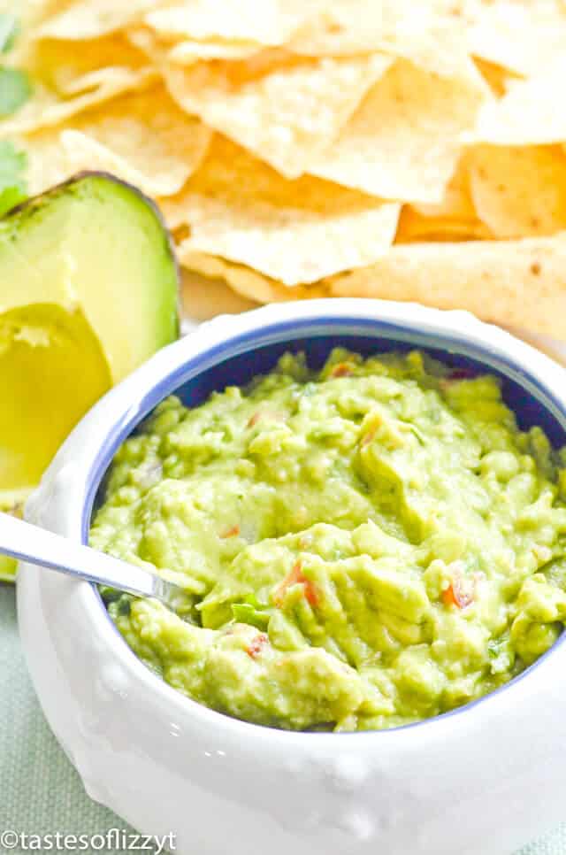 A bowl of food, with Avocado and Guacamole