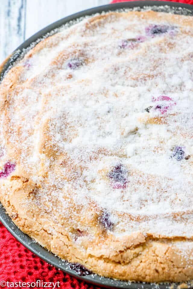 red white blue berry cake in a baking pan