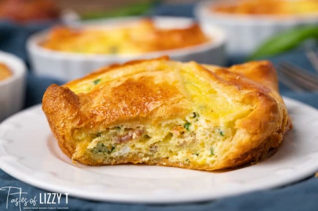 egg souffle on a plate with a bite out