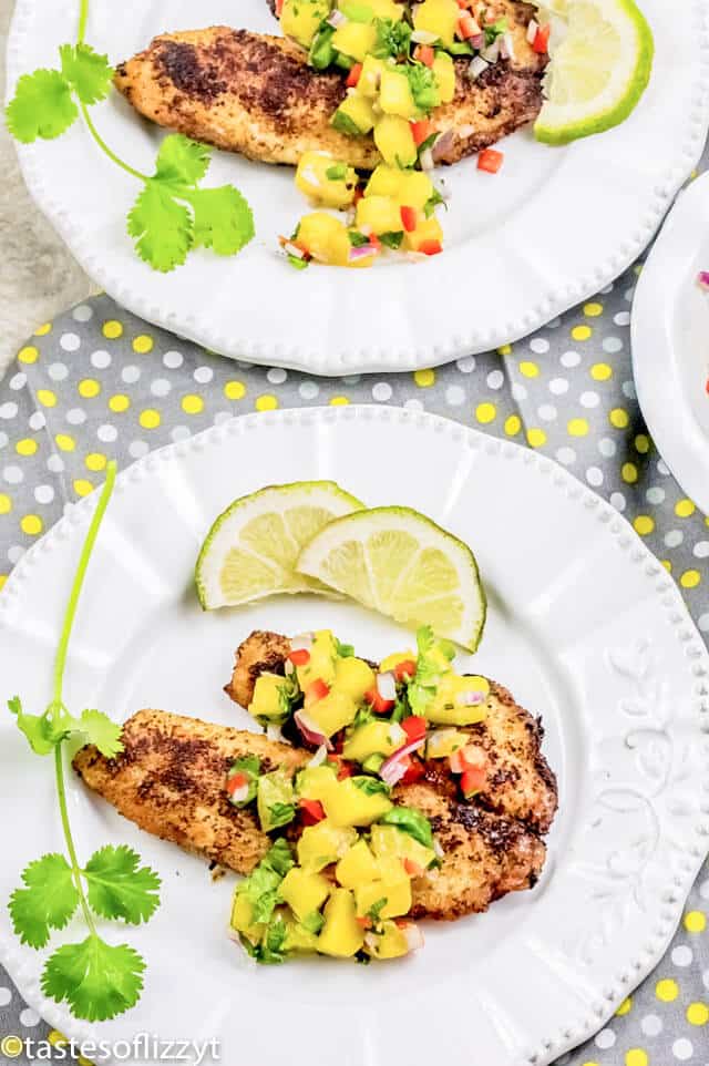 A plate of food on a table, with Tilapia and Lime