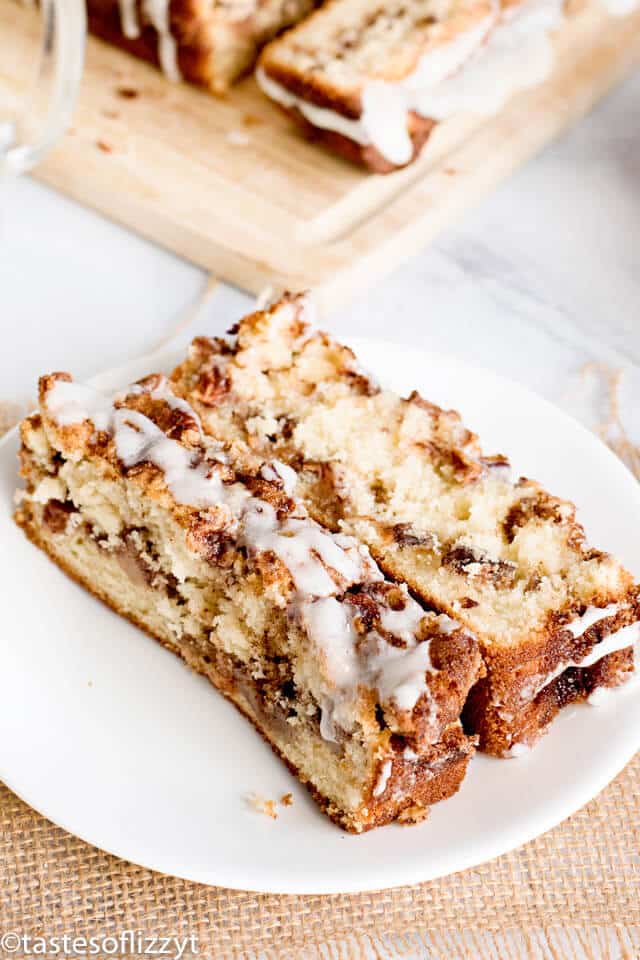 a slice of homemade apple quick bread with cinnamon streusel glaze