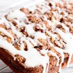 loaf of apple fritter bread with glaze