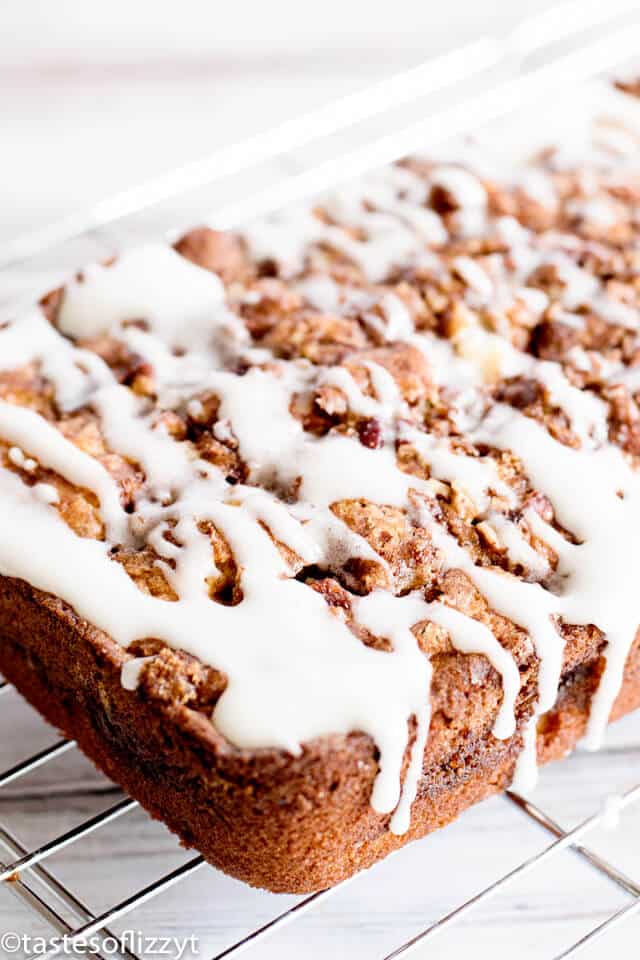 loaf of apple fritter bread with cinnamon streusel glaze