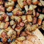 crispy oven roasted potato on a cast iron pan