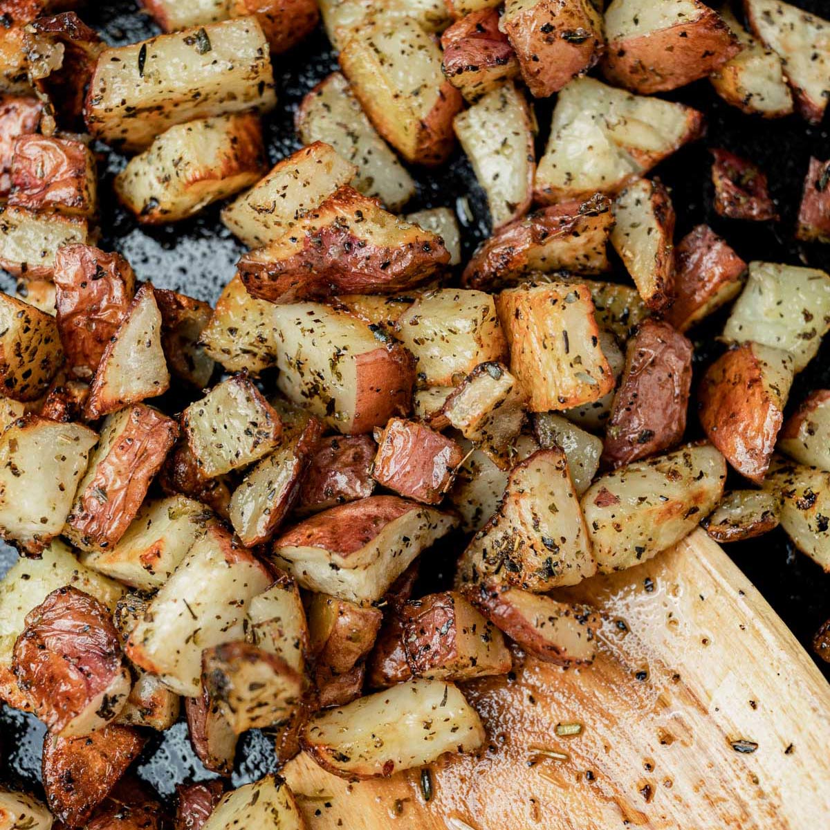 crispy oven roasted potato on a cast iron pan