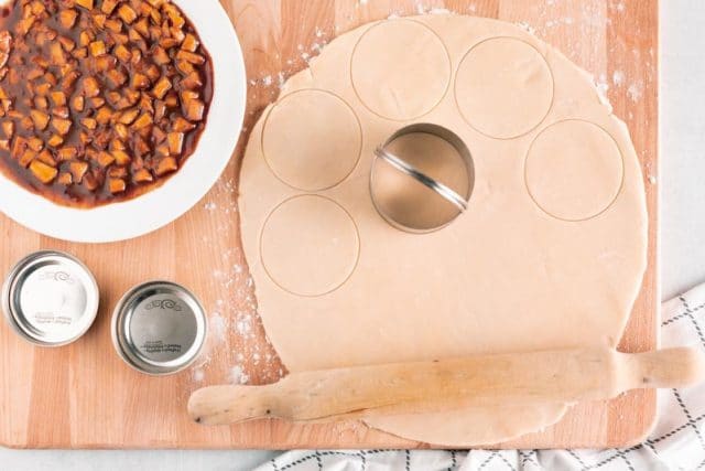 cutting dough for mini apple pies