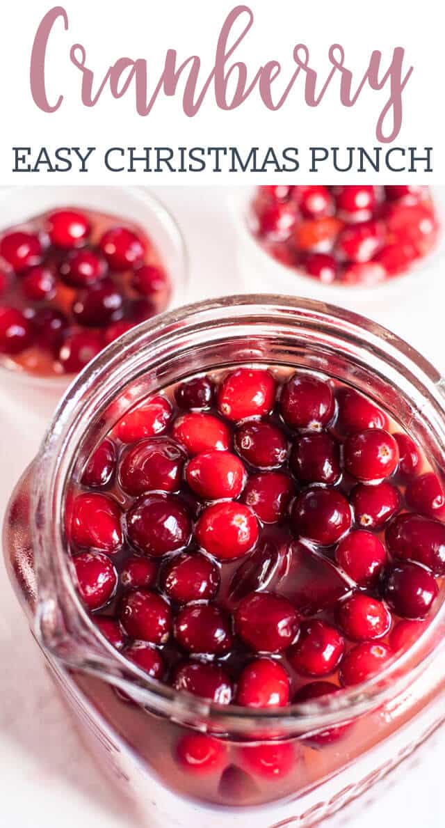 An easy, 5 minute cranberry punch recipe that your holiday guests will love. Cranberry juice, lemonade and orange juice pair with ginger ale for a sparkling fruit drink that is so pretty served with cranberries.