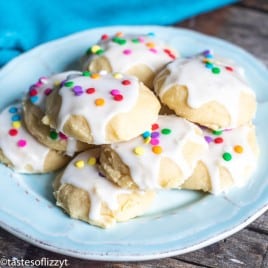 a plate of sprinkle cookies