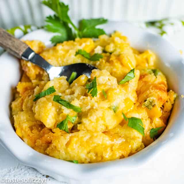 corn casserole in a bowl with a spoon