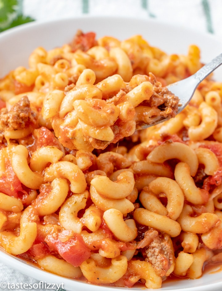 macaroni and beef in a bowl with a fork