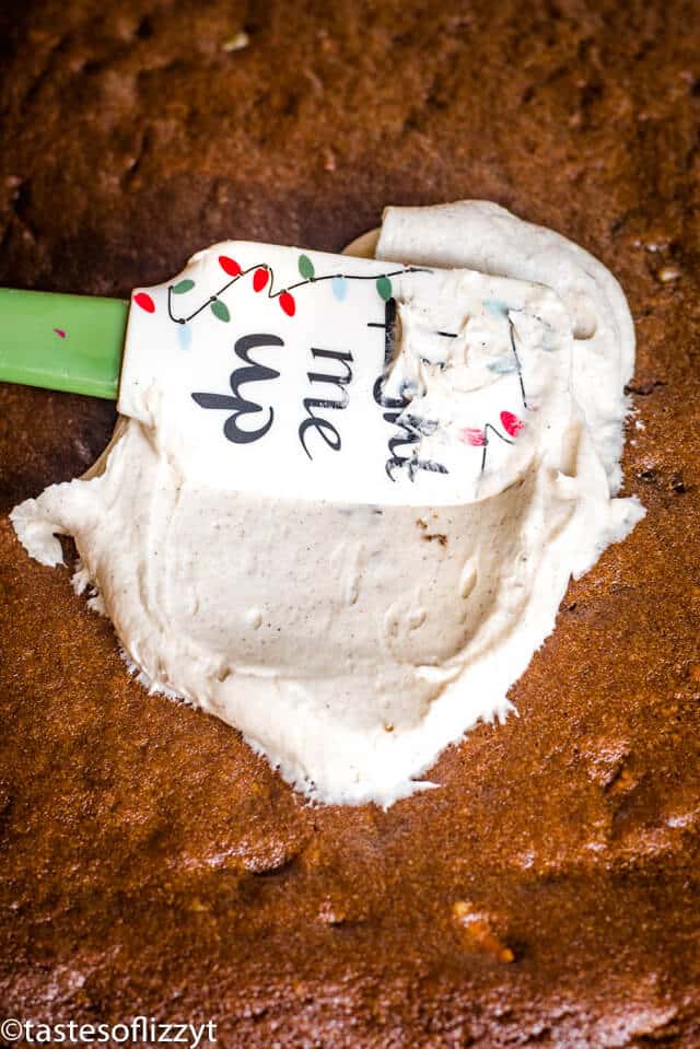 spiced frosting on molasses cake bars