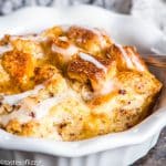 cinnamon roll breakfast bake with powdered sugar glaze