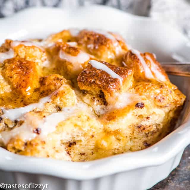 A close up of a plate of food, with Cinnamon roll bread pudding