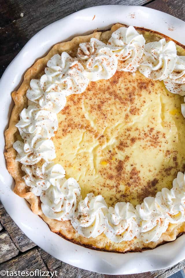 overhead view of custard pie with whipped cream