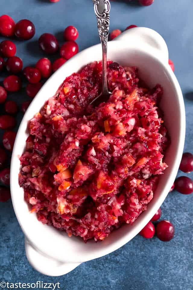 a bowl of cranberry relish with a spoon