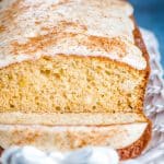 A loaf of eggnog bread on a plate