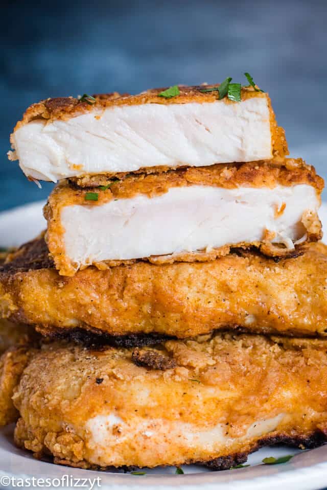 stack of fried pork chops with one cut in half