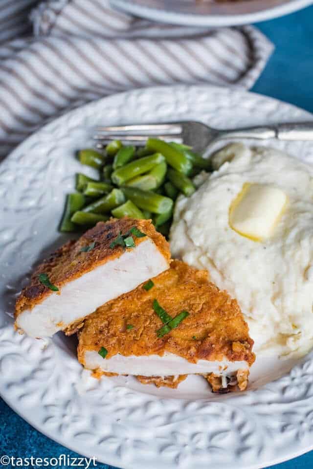 Fried Pork Chops with mashed potatoes and green beans