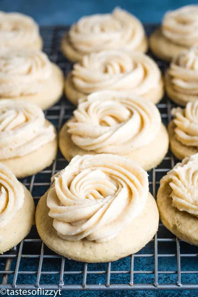 frosted eggnog cookies on a wire cooling rack