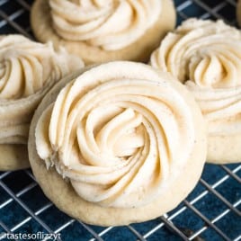 soft eggnog cookies topped with swirls of eggnog frosting