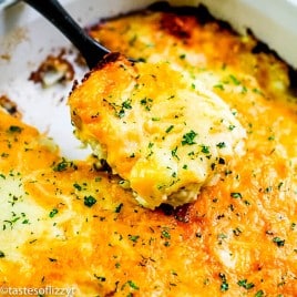 scalloped potatoes with cheese and fresh herbs