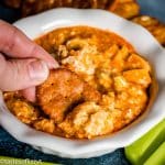 cheesy buffalo dip with cracker