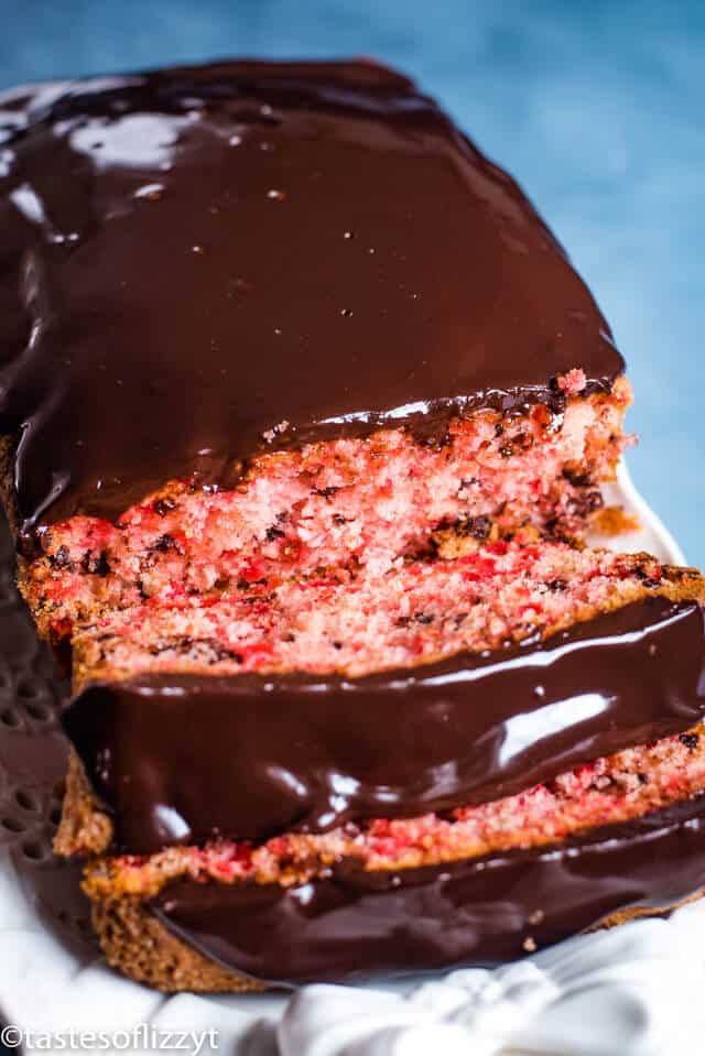 A close up of a piece of chocolate cherry bread