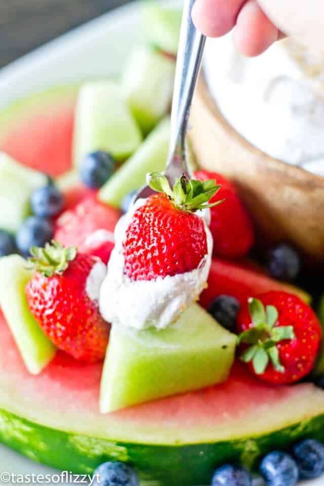 cool whip and strawberry on a spoon