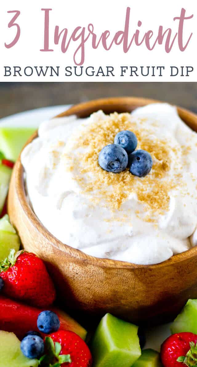 A close up of a bowl of fruit dip, with Cool Whip and Sour cream