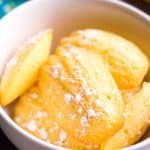 white bowl filled with lemon madeleine cookies