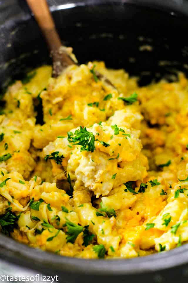 slow cooker cheesy pasta on a spoon