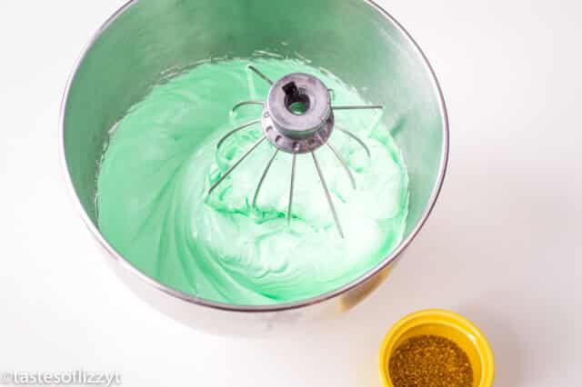 green meringue in a mixing bowl