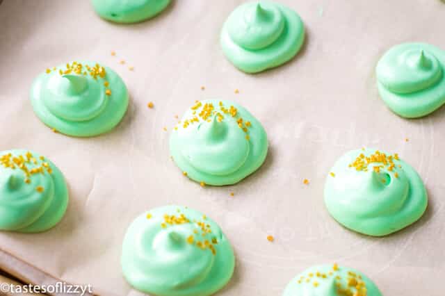 green meringue cookies on a sheet