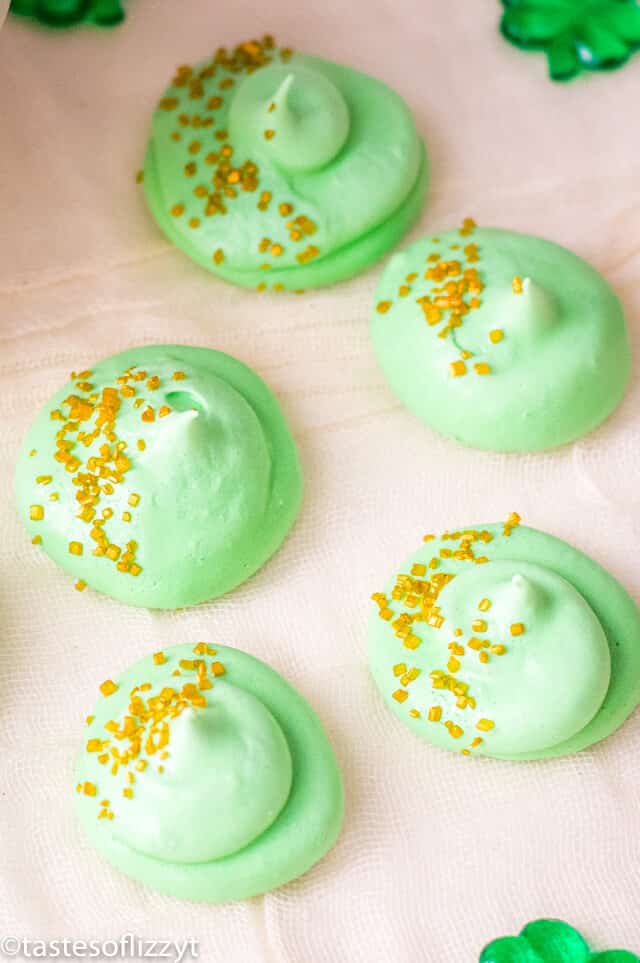 green meringue cookies on a sheet