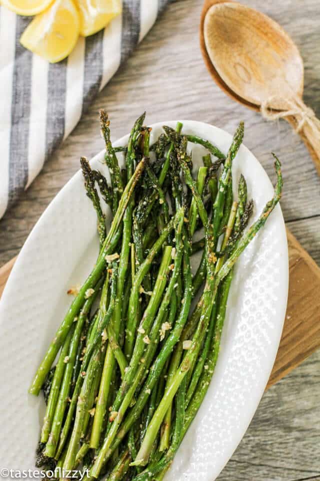 A plate of asparagus on a table