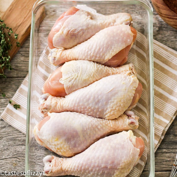 uncooked chicken drumsticks in a bowl