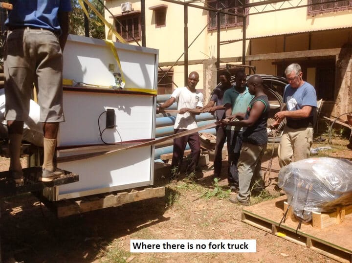men moving heavy things