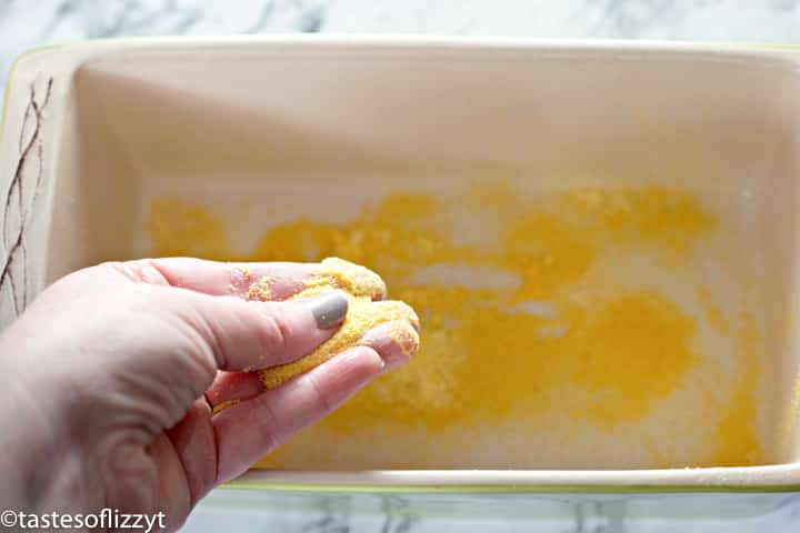 sprinkling cornmeal in baking dish