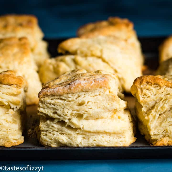 A close up of baking sheet of biscuits